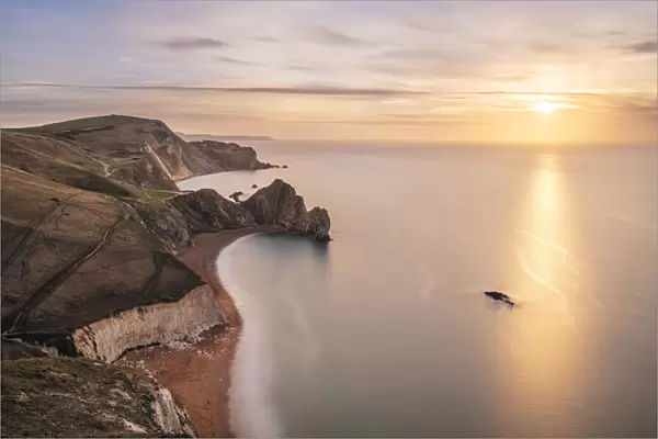 Durdle Door at sunrise from Swyre Head, Lulworth, Isle of Purbeck