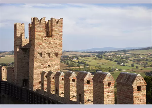 The walls of the medieval village of Gradara with the hills in the background