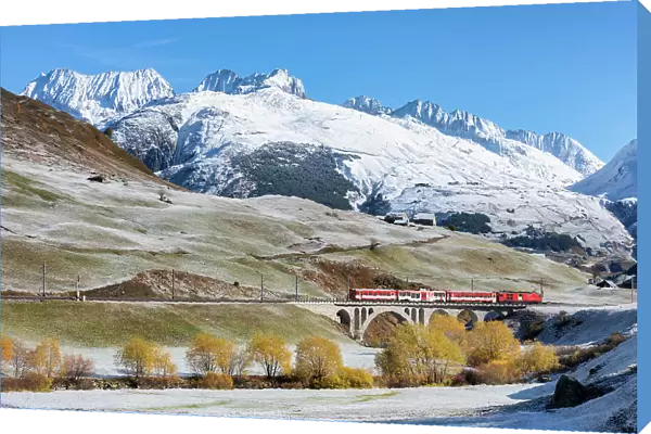 The red train of Canton Uri during autumn, Canton of Uri, Switzerland