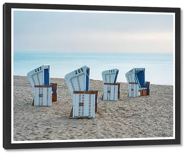 Beach chairs at Hornum beach at dawn, Sylt, Nordfriesland, Schleswig-Holstein, Germany