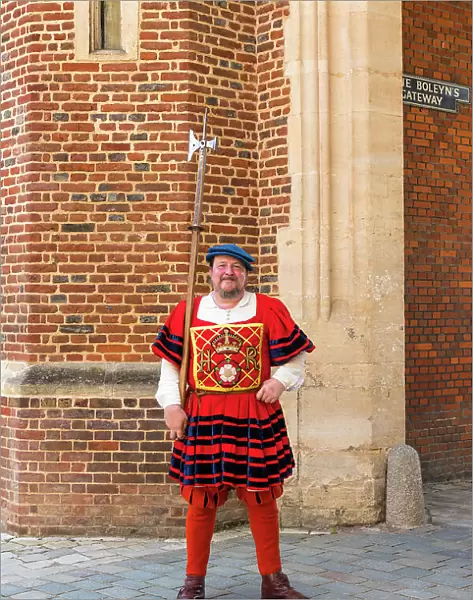 A guard outside Anne Boleyn Gatehouse, Hampton Court Palace, London, England