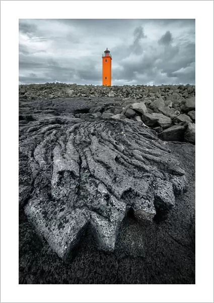 Selvogsviti Lighthouse and ancient lava flow, Strandakirkja, Iceland