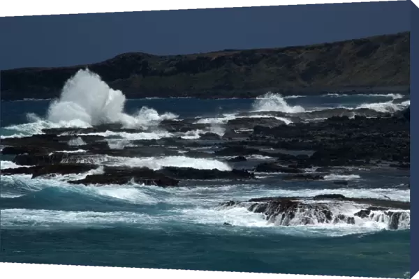 Waves crashing at enseada da Caieira, Fernando de Noronha, Pernambuco, Brazil