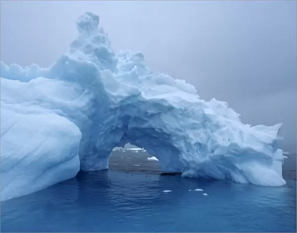Detail of arch in iceberg. Paradise Bay, Antarctica