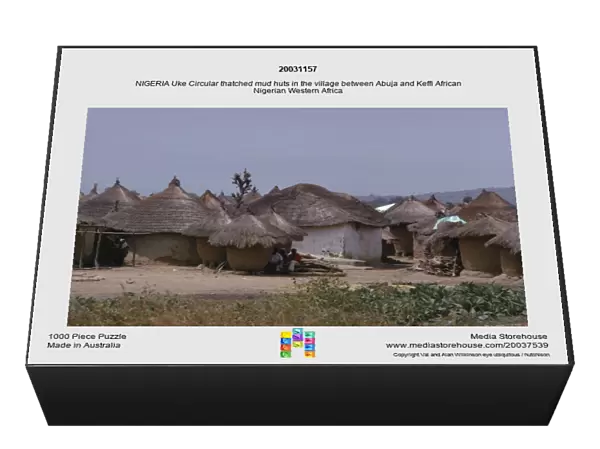 20031157. NIGERIA Uke Circular thatched mud huts in the village between Abuja