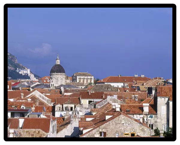Croatia Dalmatia Dubrovnik View through a slit in the city walls looking over rooftops