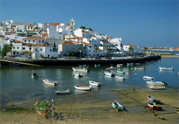 20064156. PORTUGAL Algarve Ferragudo White painted town buildings overlooking harbour