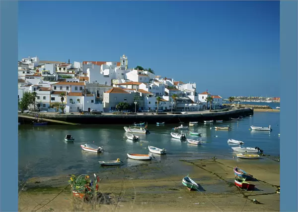 20064156. PORTUGAL Algarve Ferragudo White painted town buildings overlooking harbour