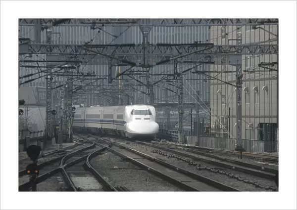 Japan Tokyo a nozomi shinkansen bullet train arrives at station