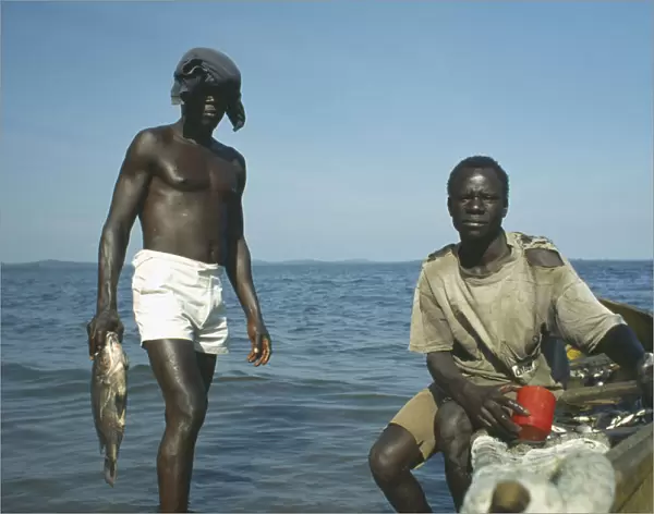 20032505. UGANDA Kampala Men fishing in Lake Victoria