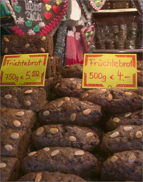 20069311. GERMANY Nuremberg Stall selling Fruchtebrot