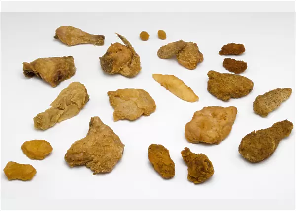 Food, Cooked, Poultry, Display of various battered and breaded fried portions of chicken