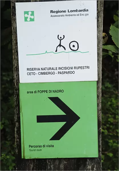 Italy, Lombardy, Valcamonica, Foppi di Nadro, Riserva Naturale Incisioni Rupestri sign