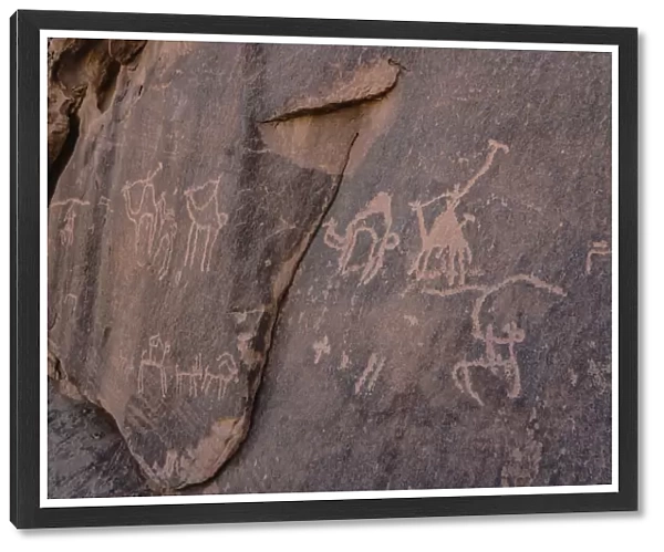Ancient Thamudic rock art or petroglyphs in Wadi Rum in Jordan