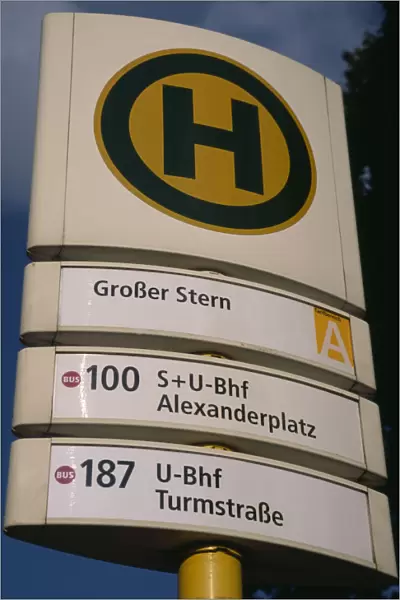 GERMANY, Berlin Bus and tram stop sign, green H within yellow circle stands for