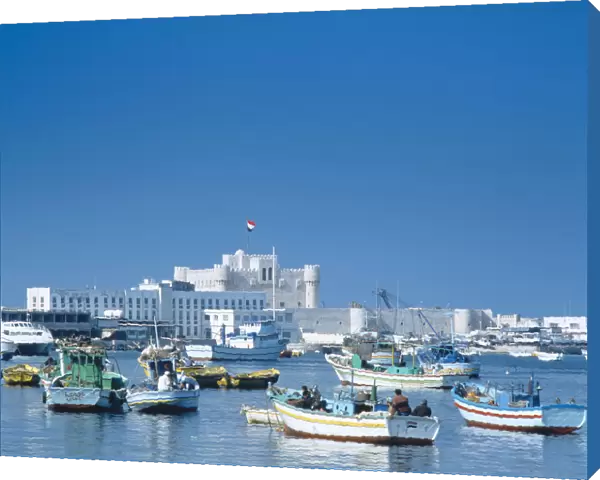 10000384. EGYPT Nile Delta Alexandria Fishing boats moored in harbour with fortress castle