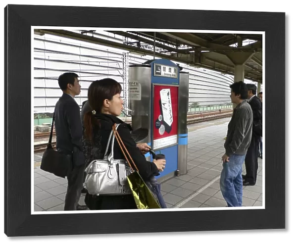20086607. JAPAN Honshu Tokyo Yurakucho - the smokers spot on the train platform men
