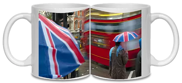 UK, England, London, Oxford Street, Shoppers in the rain