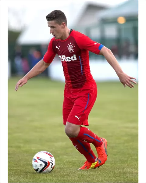 Rangers Fraser Aird in Thrilling Action against Buckie Thistle during Pre-Season Friendly at Victoria Park
