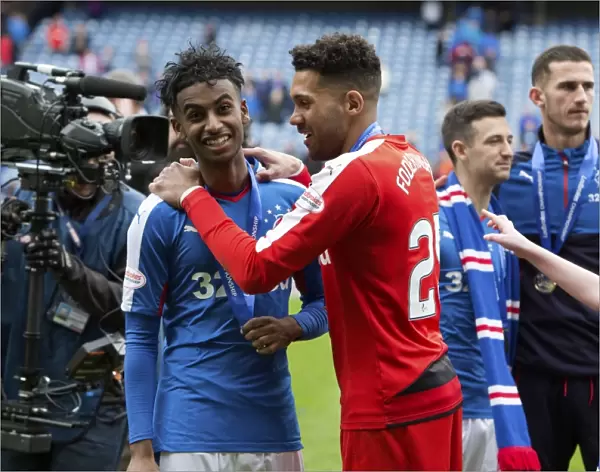Rangers Football Club: Zelalem and Foderingham Celebrate Championship Victory at Ibrox Stadium