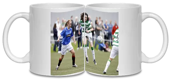 A Moment of Clarity: Heather McGaw Clears the Ball Against Cheryl Gallacher in the Celtic vs Rangers Ladies Match (2008)