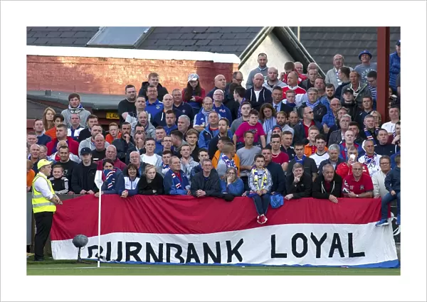 Rangers Fans Triumph: Celebrating at Ochilview Park during Betfred Cup Victory against East Stirlingshire