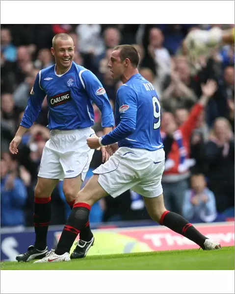 Rangers Kris Boyd and Kenny Miller: Unstoppable Duo Celebrates Goal in Rangers 2-1 Victory over Kilmarnock