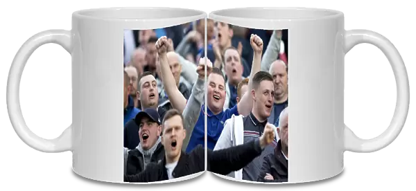 A Sea of Passion: Rangers Fans Celebrate Triumph at Pittodrie Stadium (Scottish Premiership & Scottish Cup, 2003)