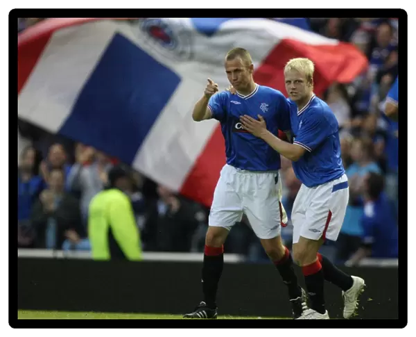 Rangers Football Club: Kenny Miller and Steven Naismith's Euphoric Moment as They Celebrate Goals in Pre-Season Friendly Against Manchester City (3-2)