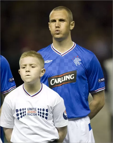 Ibrox Showdown: Rangers FC's Heartbreaking 1-4 Defeat to Unirea Urziceni in Champions League Qualifying - Kenny Miller's Last Stand with the Mascot