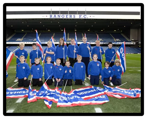 Rangers Kids Celebrate 2-1 Victory Over St Mirren at Ibrox Stadium with Flags