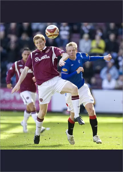 Rangers Steven Naismith Fights Past Hearts Jason Thomson: Rangers Dominance in Clydesdale Bank Premier League Match (Hearts 1-4 Rangers)