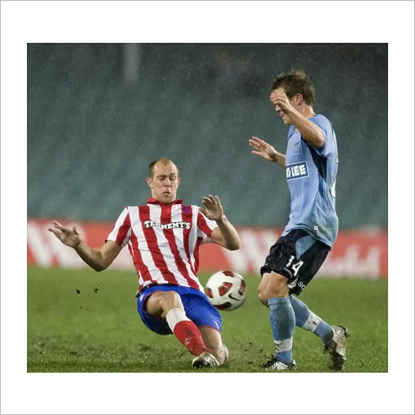 Whittaker vs Brosque: Intense Tackle at Sydney Football Stadium - Rangers vs Sydney FC (Sydney Festival of Football 2010)