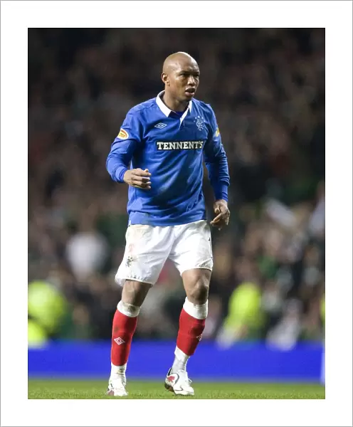 El Hadji Diouf's Stunning Solo Goal: Rangers Shock Celtic Park in Scottish Cup Fifth Round Replay (1-0)