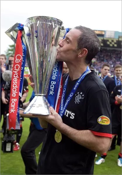 Rangers Football Club: David Weir's Triumphant Moment - Celebrating SPL Championship Glory at Rugby Park (2010-11)