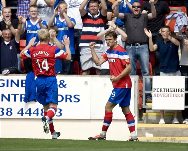 Rangers Nikica Jelavic Celebrates Glory: 2-0 Win Over St. Johnstone in Scottish Premier League