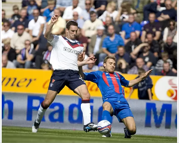Rangers Lee Wallace vs. Inverness Caledonian Thistle's Chris Hogg: Intense Clash in 2-0 Rangers Victory at Tulloch Caledonian Stadium