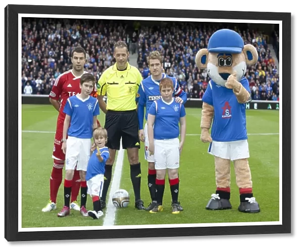 Rangers Football Club: Triumphant Moment with Mascots Celebrating 2-0 Win over Aberdeen at Ibrox