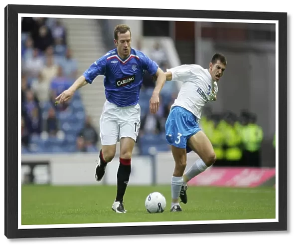 Rangers vs FK Zeta: Champions League Qualifier - Clash between Charlie Adam and Milan Vuckovic (2-0 at Ibrox)