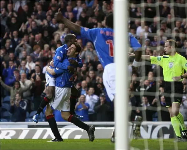 Rangers Carlos Cuellar and DaMarcus Beasley: Celebrating a 2-0 Goal Against Inverness Caledonian Thistle