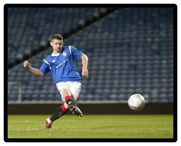 Fraser Aird Scores the Decisive Penalty: Thrilling Glasgow Cup Final Shootout between Rangers U17s and Celtic U17s at Ibrox Stadium (2012)
