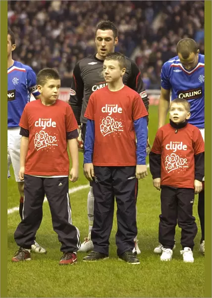 Rangers Football Club's Cash for Kids Mascot Celebrates 2-1 Victory over Hearts in Clydesdale Bank Premier League Battle at Ibrox