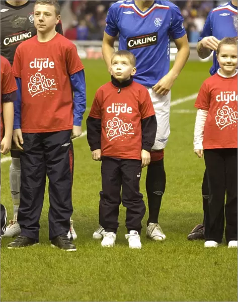 Rangers Football Club's Thrilling 2-1 Victory with Cash the Mascot at Ibrox for Cash for Kids Charity Event