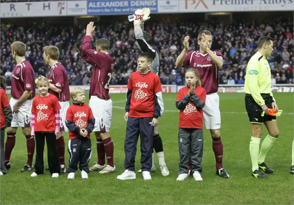 Thrilling Rangers Victory: 2-1 Over Hearts in the Clydesdale Bank Premier League at Ibrox - Joyful Cash for Kids Mascots