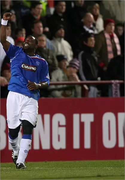 Rangers Euphoric Victory: Jean-Claude Darcheville Scores in 4-0 Thrashing of Hearts at Tynecastle Stadium (Clydesdale Bank Premier League)