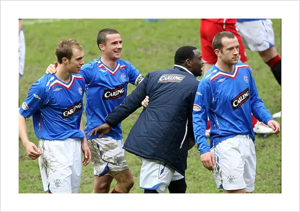 Rangers: Celebrating a Hard-Fought 1-0 Victory Over Celtic (Steven Whittaker, Barry Ferguson, Jean Claude Darcheville, and Charlie Adam)