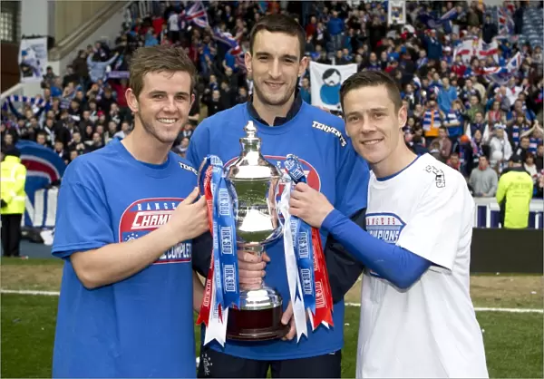 Rangers Football Club: Celebrating Promotion to Scottish Third Division with the Irn Bru Trophy - A Historic 1-0 Victory over Berwick Rangers at Ibrox Stadium