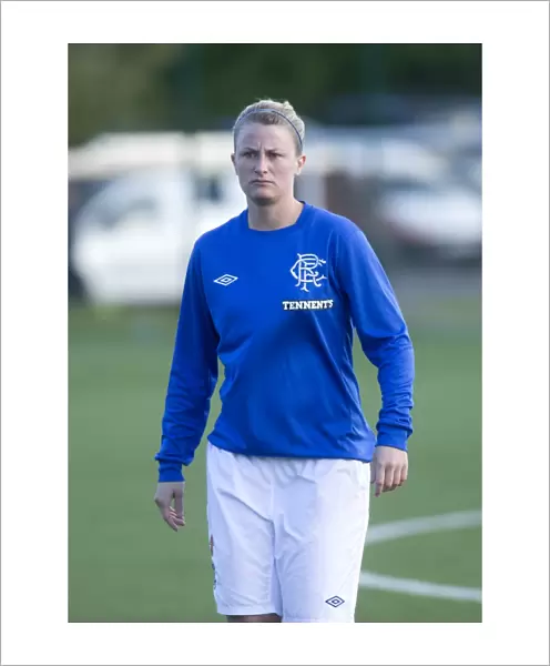Intense Battle: Jill Paterson of Rangers FC vs. Hibernian Ladies - Scottish Women's Premier League Soccer Match