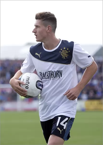 Rangers Face a Challenging League Cup Match: Forfar Athletic vs Rangers (2-1) - Fraser Aird's Determined Performance