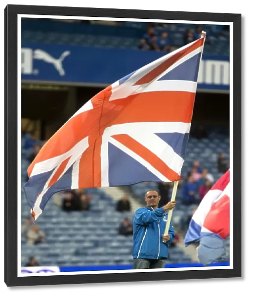 Rangers 2-0 Berwick Rangers: Ramsden Cup Round Two at Ibrox Stadium - Flag Bearer with the Rangers Flag